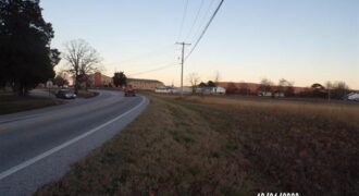 Listing # 844 – Highway Commercial Property Along State Hwy 14 with View of the Beautiful Ozark Mountains Plus Residential Behind the Commercial Property